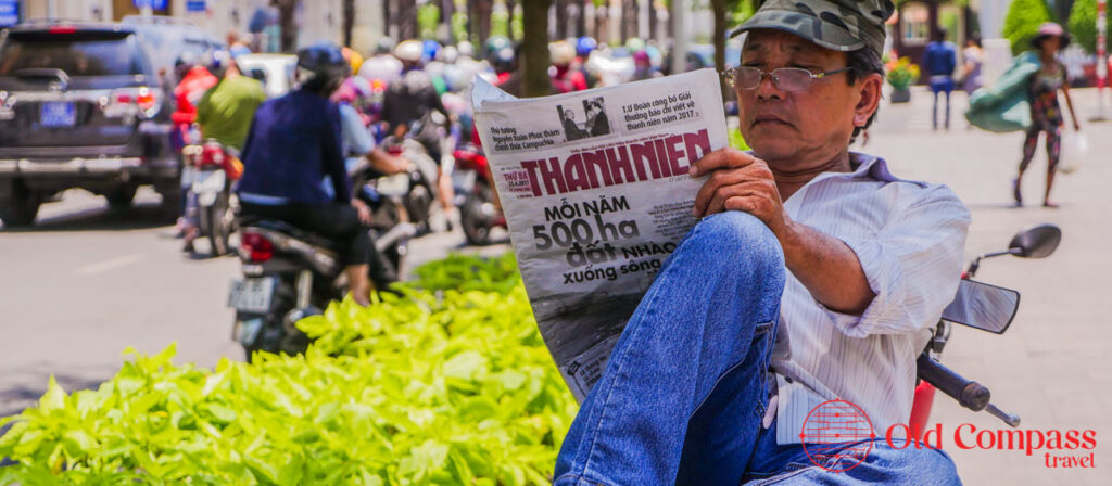 Saigon motorcycle taxi rider @ Mark Bowyer